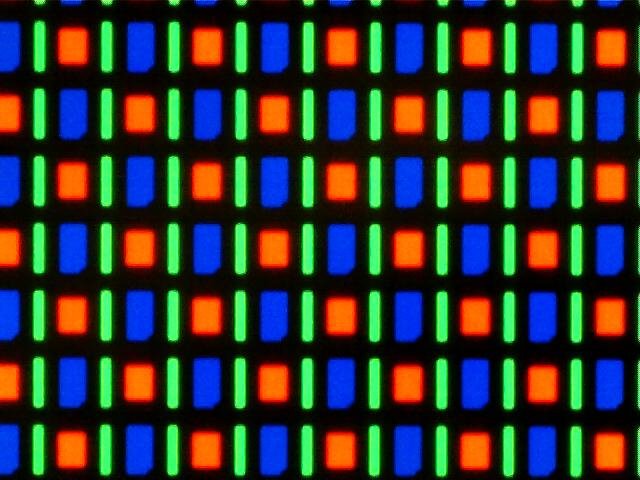 Macro photograph of an AMOLED phone screen showing a PenTile subpixel layout with alternating red-green and blue-green pairs
